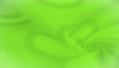 Girdap desenleri ve pürüzsüz kıvrımları olan canlı yeşil kumaş bulanıklığı yumuşak, akıcı bir tasarım yaratır. Soyut doku, akışkan bir hareket ve hafiflik hissi uyandırıyor..