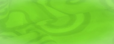 Pürüzsüz kıvrımlı yeşil kumaş ve kıvrımlı desenler canlı, dalgalı bir doku yaratır. Soyut, havadar tasarım, kumaşın yüzeyinde bir hareket ve hafiflik hissi uyandırıyor..