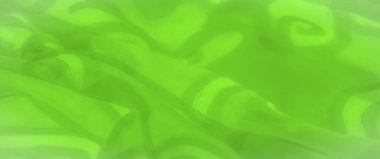 Girdap şeklinde soyut desenleri olan canlı yeşil kumaş bulanıklığı. Yumuşak doku ve dinamik eğriler bu kumaşı ürün tasarımında veya zengin bir arkaplan ögesi olarak kullanmak için mükemmel hale getirir.