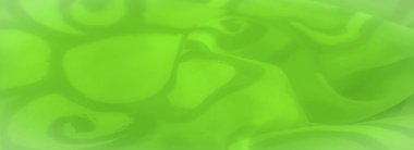 Görüntü. Canlı, neon renkli, kıvrımlı, soyut tasarımlar ve dinamik bir görüntü oluşturan yumuşak kıvrımlar. Kumaşın parlaklığı ve pürüzsüz dokusu onun parıldayan görünümünü vurgular