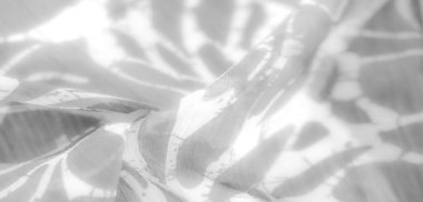 Bulanık Bu gri ölçekli kumaş görüntüsü yumuşak kıvrımları ve soyut bir şablonu ortaya çıkarır, ışık ve gölgeyle kusursuz bir şekilde harmanlanır. Kumaşların narin dokusu ruhani, neredeyse ağırlıksız bir görünüş yaratıyor.