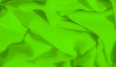 Pürüzsüz, akışkan yeşil kumaş katmanları soyut kıvrımlar ve dokular oluşturur. Karmaşık kumaş dokuma ve gölgeleme büyüleyici bir ışık ve biçim oyunu yaratır..