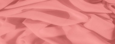 Akan pembe kumaşın bulanıklığı yumuşak dokuları ve zarif kıvrımları ortaya çıkarır, moda, ev dekorasyonu ve tasarım ilhamı için lüks bir estetik sunar..