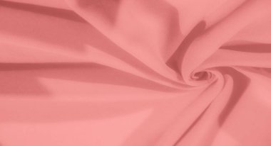 Yumuşak kıvrımlı, pürüzsüz pembe kumaştan oluşan bulanıklık havadar ve narin bir doku yaratıyor. Kusursuz kıvrımlar kumaşın hafif ve nazik doğasını vurgular..