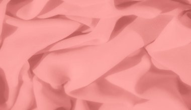 Pembe kumaşın yumuşak kıvrımlarını bulanıklaştırmak akıcı, organik bir his yaratır. Yumuşak dokusu ve ince gölgeleri zarif görünümünü geliştirir. Bu da onu sıcaklığa ihtiyaç duyan tasarımlar için mükemmel bir seçim yapar.