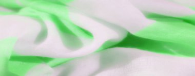 Açık yeşil ve beyaz kumaşlı bulanık yumuşak dalgalarla sarmalanmış. Pürüzsüz dokusu ve canlı renkleri modern, pürüzsüz bir desen sağlıyor. Tekstil ve moda tasarımı için mükemmel..