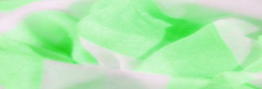 Açık yeşil ve beyaz kumaşlı bulanık yumuşak dalgalarla sarmalanmış. Pürüzsüz dokusu ve canlı renkleri modern, pürüzsüz bir desen sağlıyor. Tekstil ve moda tasarımı için mükemmel..