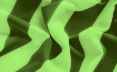 Bulanık efekt yumuşak kumaş üzerindeki koyu yeşil ve siyah deseni yakalar, dalgalı kıvrımları gösterir. Arkaplanlara ve yaratıcı projelere modern, canlı bir dokunuş eklemek için ideal.