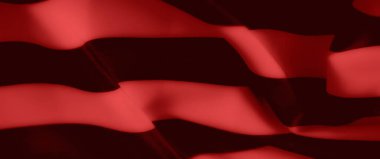 Görüntü - Katları akan kırmızı kumaşın büyüleyici bir yakın çekimi, dokusunun güzelliğini gösteriyor. Gölgeler ve gölgeler kumaşın ipeksi görünümünü güçlendirir ve lüks hissi katar.