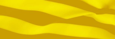 Bulanık - Burada gösterilen canlı sarı kumaşın dinamik gölgeler ve gölgeler yaratan, maddeye canlı, boyutsal bir kalite veren yumuşak ve dalgalı bir dokusu var.