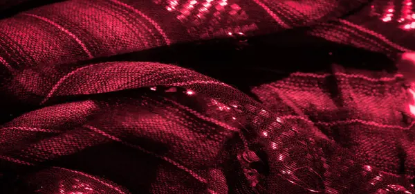 Parlak dokuları ve kalın desenleri olan zengin detaylı kırmızı kumaş bulanıklığı. Pürüzsüz kıvrımlar ve dinamik ışıklandırma, üst düzey tekstil ve moda tasarım projeleri için ideal olan görsel cazibeyi artırıyor.