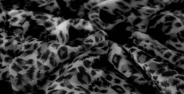 Bulanık, katıksız kumaş ve soyut siyah bir tasarım. Akıcı doku ve hafif oyun, modern estetiği geliştirmek için yumuşak, ruhani bir görünüm verir..