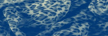 Soyut botanik baskıları ve yumuşak kıvrımları olan mavi kumaşın bulanık detaylı görüntüsü. Şablon kumaş boyunca kusursuz bir şekilde harmanlanır, ince dokular ve sanatsal zerafet sergiler..