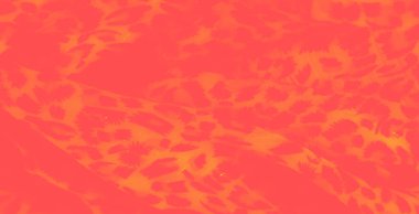 Canlı turuncu ve sarı tonlarda bulanık desenler. Yumuşak, karmaşık dokuları hayvana ya da çiçekten esinlenilmiş tasarımlara benziyor..