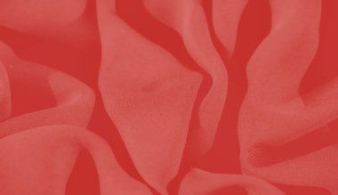 Bulanık kırmızı kumaş nazik dalgalar halinde akar, soyut, yumuşak bir doku yaratır, bu da lüks kalitesini katmanlı kıvrımlarla ve ince ışıklandırma efektleriyle vurgular.