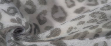 Görüntü, bu kumaş soyut gri beyaz desenler sergiliyor. Yumuşak kıvrımlı ve havadar. Tasarım modern ve çok yönlü, geniş bir yaratıcı uygulama yelpazesi için mükemmel..