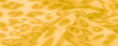 Yumuşak hayvan desenli bulanık sarı tekstil hem moda hem de iç tekstil uygulamalarını geliştiren sıcak ve davetkar bir model oluşturuyor..