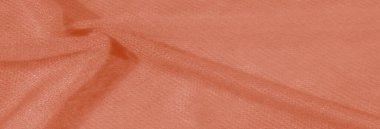 Portakal dokusunun yumuşak kıvrımlar ve gölgelerle dolu zengin dokusu görsel olarak çekici ve dokunsal bir tasarım yaratır. Kumaşın dokuma ayrıntıları derinlik ekler,