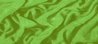 Karmaşık kıvrımlı parlak yeşil kumaştan oluşan bulanık bir görünüm yaratıyor. Lüks malzeme ve zengin renk yaratıcı tasarım geçmişi ve tekstil uygulamaları için mükemmeldir..
