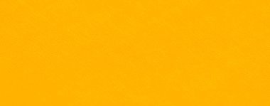 Yumuşak, dokulu görünümlü, canlı sarı bir kumaşın bulanıklığı. Karmaşık kıvrımlar dinamik bir akış yaratıyor ve gölgelerin ince bir oyunu, sıcaklık ve derinliği çağrıştırıyor..