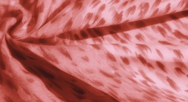 Sofistike kırmızı kumaş bulanıklığı. Lüks kıvrımlarını tamamlayan yumuşak, organik bir desen. Son moda ve dekorasyon için mükemmel bir şekilde uygun..