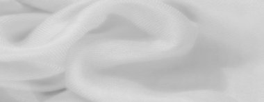 Yumuşak, yumuşak kıvrımlı bulanık beyaz kumaş ve sakin, akıcı bir doku. Pürüzsüz yüzey ve minimalist stil onu zarif ve zarif arka planlar için ideal kılar..