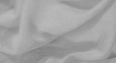 Bu beyaz kumaş yumuşak kıvrımlı yumuşak bir örtü sergiliyor, pürüzsüz ve sakin bir görünüm yaratıyor. Monokromatik doku basitliğini ve zarafetini vurguluyor, minimalist temalar için ideal.