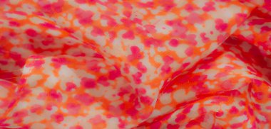 Yumuşak, narin kumaş bulanıklığı soyut, çiçeklerden esinlenilmiş pembe ve turuncu renklerin eğlenceli bir karışımı. Işık, şeffaf doku rahatlatıcı ve tuhaf bir cazibe yaratır..