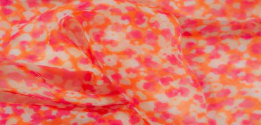 Pembe ve turuncu soyut çiçek desenli saf kumaş bulanıklığı. Hafif malzeme ve hassas akış genel tasarıma yumuşak ve romantik bir cazibe getirir..