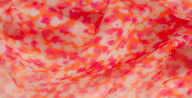 Pembe ve turuncu tonların yumuşak bir karışımı ile bulanık ve canlı kumaş sıcak ve enerjik bir estetik sunuyor. Bu tekstil doğal bir akış sergiliyor ve nazikçe katlanıyor..