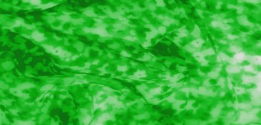 Soyut ve doğal şekilli yeşil desenli kumaş bulanıklığı derinlik ve hareket hissi veriyor. İnce gradyanlar ve dokular sanatsal ücreti arttırır.