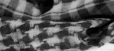 Gri tonlu yüksek çözünürlüklü kareli kumaş bulanıklığı, ince ışık ve karmaşık dokularla dokunmuş desen. Bu yakın çekim zarafeti yumuşak kıvrımlarda ve gölge oyunlarında yakalar.