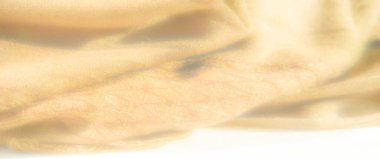 Karmaşık dokuma detayları ve yumuşak, rahat görünümlü bulanık sarı kumaş. Sıcak, ışıl ışıl dokusu bu tekstilin davetkar havasını arttırır..