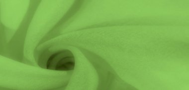 Yumuşak pileli canlı yeşil kumaş bulanıklığı soyut ya da kumaş temalı görseller için ideal desenli desen oluşturuyor. Pürüzsüz, dalgalı yapısı tasarıma doğal, organik bir his katıyor..