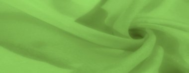 Yumuşak bir doku oluşturan katmanlı katmanlı yeşil kumaş bulanıklığı. Pürüzsüz, akışkan tasarım onu soyut, moda veya tekstil projeleri için mükemmel bir arkaplan yapar..