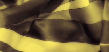 Bulanık etkisi bu sarı ve siyah kumaş desenine derinlik katıyor ve sarı tabanda parlak siyah aksanlar oluşuyor. Dokulu kumaşın çağdaş ve şık bir cazibesi var..