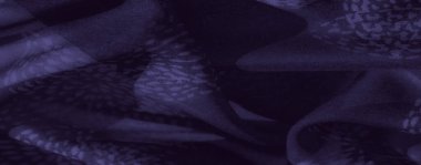 Görüntü. Kıvrımlı kıvrımlı, karmaşık desenli, yumuşak gölgeler ve hassas gölgeler yakalayan koyu mor bir kumaşın yakın çekimi. Kumaşı pürüzsüz.,