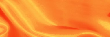 Parlak, yansıtıcı kıvrımlı turuncu saten kumaştan bir bulanıklık. Lüks bir parıltı. Yaratıcı projelere ve tasarım elementlerine zarafet ve sıcaklık katıyor.