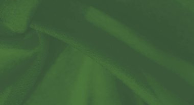 Yumuşak dalgalı bulanık yeşil kumaş yumuşak dokuya dinamik bir hareket ekler. Sanatsal tasarımlar ve tekstil ilhamı için mükemmeldir..