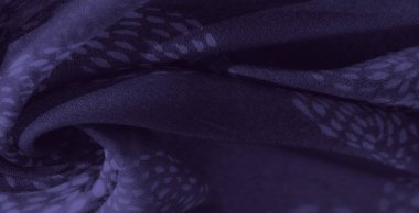 Soyut taç yaprağına benzer motifleri olan koyu bir çivit kumaşın bulanıklığı. Lüks, kadife gibi bir dokuya sahip. Yaratıcı projelere şık ve sofistike bir dokunuş eklemek için ideal..