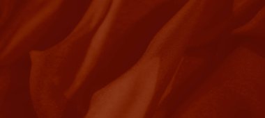 İpek görünümlü ve ince kıvrımlı canlı kırmızı kumaş bulanıklığı. Lüks dokusu ve parlak tonları onu onu sofistike tasarım ve sanatsal projeler için ideal kılıyor..