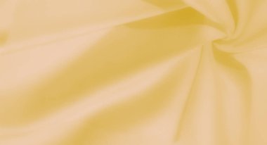 Bulanık - Karmaşık kıvrımlı ve parlak parıltılı pastel sarı bir kumaş. Yumuşak malzeme sorunsuzca akıyor, yaratıcı tasarımlar için hayali ve sanatsal bir zemin oluşturuyor..