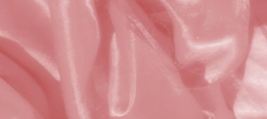 Yumuşak, dalgalı kıvrımlı ve lüks bir parlaklığı olan yüksek kaliteli pembe saten kumaş. Pürüzsüz ve ipeksi dokusu, çok yönlü tasarım projeleri için özel bir estetik sunar..