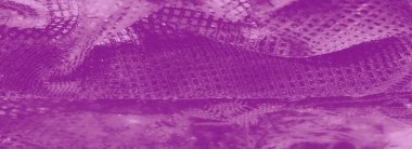 Zarif ve zarif bir tasarım yaratmak için ince detaylı desenler ve dokular içeren bulanık mor dantel kumaş..