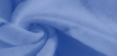 Yumuşak kıvrımlı, mavi kumaştan bulanık ve minimalist bir görünüm. Yumuşak doku ve yumuşak odak zarif ve modern tekstil tasarımları için idealdir..