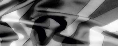 Görüntü - şık ve tek renkli, bu yakın çekim kumaş ışığı ve gölgeyi ön plana çıkarır. Gri tonlama onun sofistike ve minimalist çekiciliğini arttırır.