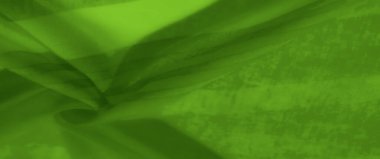 Katmanlı ve akışkan bir tasarımı olan yeşil kumaş bulanıklığı, şeffaf dokular ve yumuşak kıvrımlar sergiliyor. Zarif malzeme bir yapı ve akıcılık dengesini yakalar..