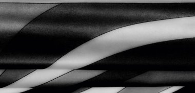 Gri tonlarda pürüzsüz kumaş, akışkan çizgiler ve nazik kıvrımlar, karmaşık gölgeler ve zarif kompozisyonlar için mükemmel sofistike bir doku..