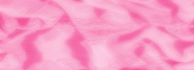 Yumuşak, dokulu yüzeyi ve yumuşak dalgaları olan bulanık pembe kumaş sakin ve yatıştırıcı bir etki yaratıyor. Pastel renk ve narin kıvrımlar kumaşın hafif ve havadar hissini arttırır.