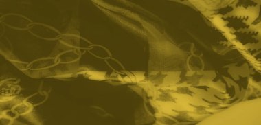 Alternatif zikzak ve zincir desenli sarı kumaşın bulanık görüntüsü. Yüksek kontrast, moda ve dekorasyon için mükemmel, cesur, modern bir tekstil tasarımı yaratır..